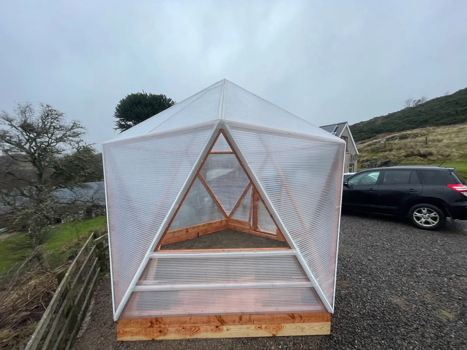 Community growing project using a Highland Domes geodesic greenhouse for collaborative food production